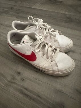 Nike White Low-Top Sneakers with Red Swoosh